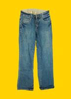 Casual jeans on yellow background photo