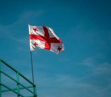 Flag of Georgia waving closeup photo