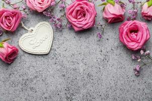 Valentine's Day card. Pink roses and gypsophila flowers photo