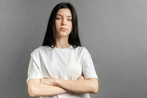 Portrait of a young girl who looks sad. photo