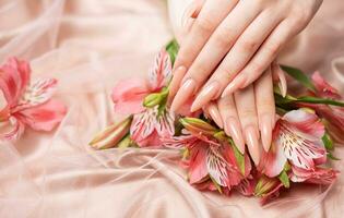 Elegant pastel pink natural manicure. photo