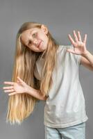 Portrait of cute little girl with long light hair photo