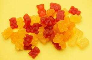 Vitamins for children,  as jelly gummy bears candy photo