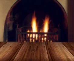 wooden table and fireplace photo