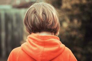 girl outdoors in hoodie photo