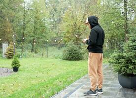 Man playing with drone photo