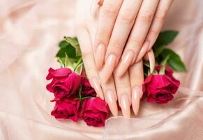 Elegant pastel pink natural manicure. photo