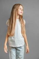 Portrait of cute little girl with long light hair photo