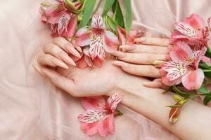 Elegant pastel pink natural manicure. photo