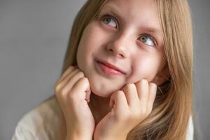 Portrait of positive cheerful girl cutely smiling photo