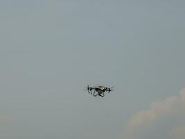 The drone can be controlled with a mobile phone using GPS signals to provide directional control over the air. photo