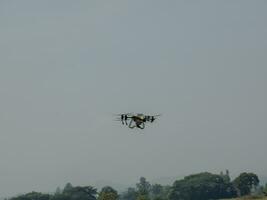 The drone can be controlled with a mobile phone using GPS signals to provide directional control over the air. photo