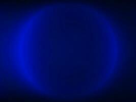 a blue light is shining on a black background, background with glowing circles vector