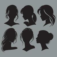 Silhouettes of women's hairstyles on a gray background. vector