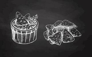 Hand-drawn sketches of bowl with guacamole, nachos and parsley leaves with a handful of nachos on chalkboard background. Vector food sketch. Illustration for menu. Latin America.