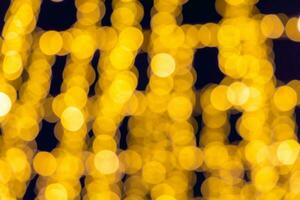 Defocused background with shiny bright celebrate lights as bokeh. photo