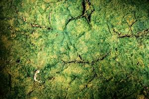 Background texture cracked clay wall with old grunge coating on the surface photo