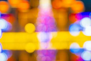 Defocused background with shiny bright celebrate lights as bokeh. photo