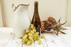 mixed with autumn fruits and a pitcher photo