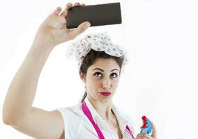 pretty housewife take selfie in a break photo