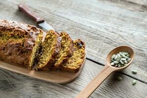 Pumpkin bread on the wooden board photo