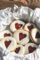 Heart shaped cookies with strawberry filling photo