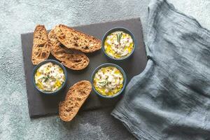 Baked ricotta with toasts photo