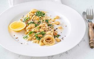 Lemon pasta with almonds photo