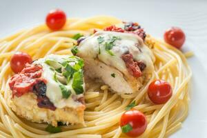 Baked chicken with parmesan and mozzarella photo