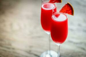 Two glasses of Mimosa cocktail photo