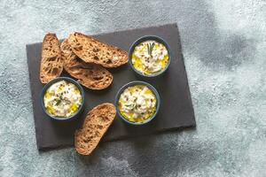 Baked ricotta with toasts photo