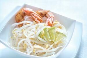 Rice noodles with shrimps and bean sprouts photo