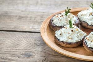 Baked mushrooms stuffed with cream cheese photo