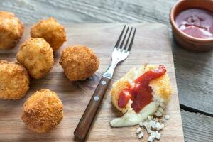 Arancini - rice balls with mozzarella photo