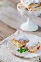 Mille-feuille with fresh cherry photo