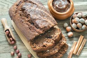 Loaf of banana-chocolate bread with chocolate cream photo