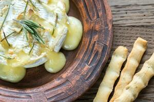 Baked Camembert cheese photo