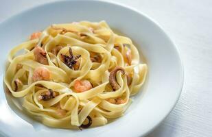 Tagliatelle pasta with seafood photo