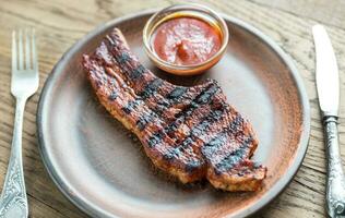 Portion of grilled pork ribs photo