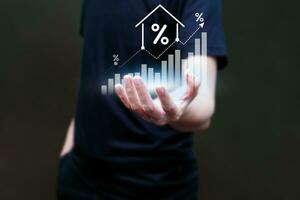 Hand of man touching data analytics graph on virtual screen. Real estate investment, market and analytics concept. photo