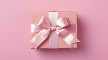 AI generated Pink gift box with bow isolated on pink background. Flat lay. Birthday, wedding, love and valentines day concept photo