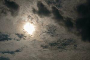 Bright Sun in Cloudy Skies photo