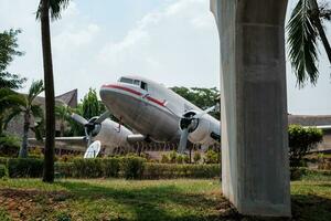 Jakarta, Indonesia - October 2 2023. Decommissioned Airplane on Green Field photo