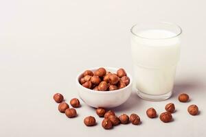 Hazelnut non diary milk and nuts. Health care and diet concept photo