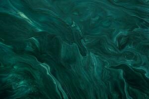 Fluid Art. Liquid Velvet Jade green abstract drips and wave. Marble effect background or texture photo