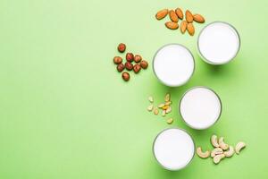 Nuts non diary milk in glasses . Health care, diet and nutrition concept photo