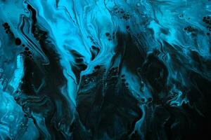 Fluid Art. Blue abstract wave swirls on black background. Marble effect background or texture photo