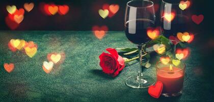 Wine glasses, rose and hearts bokeh lights. Valentines day concept. Banner format photo