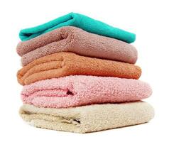 Stack of the home towels on white photo