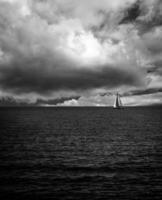 lonely boat at sea photo
